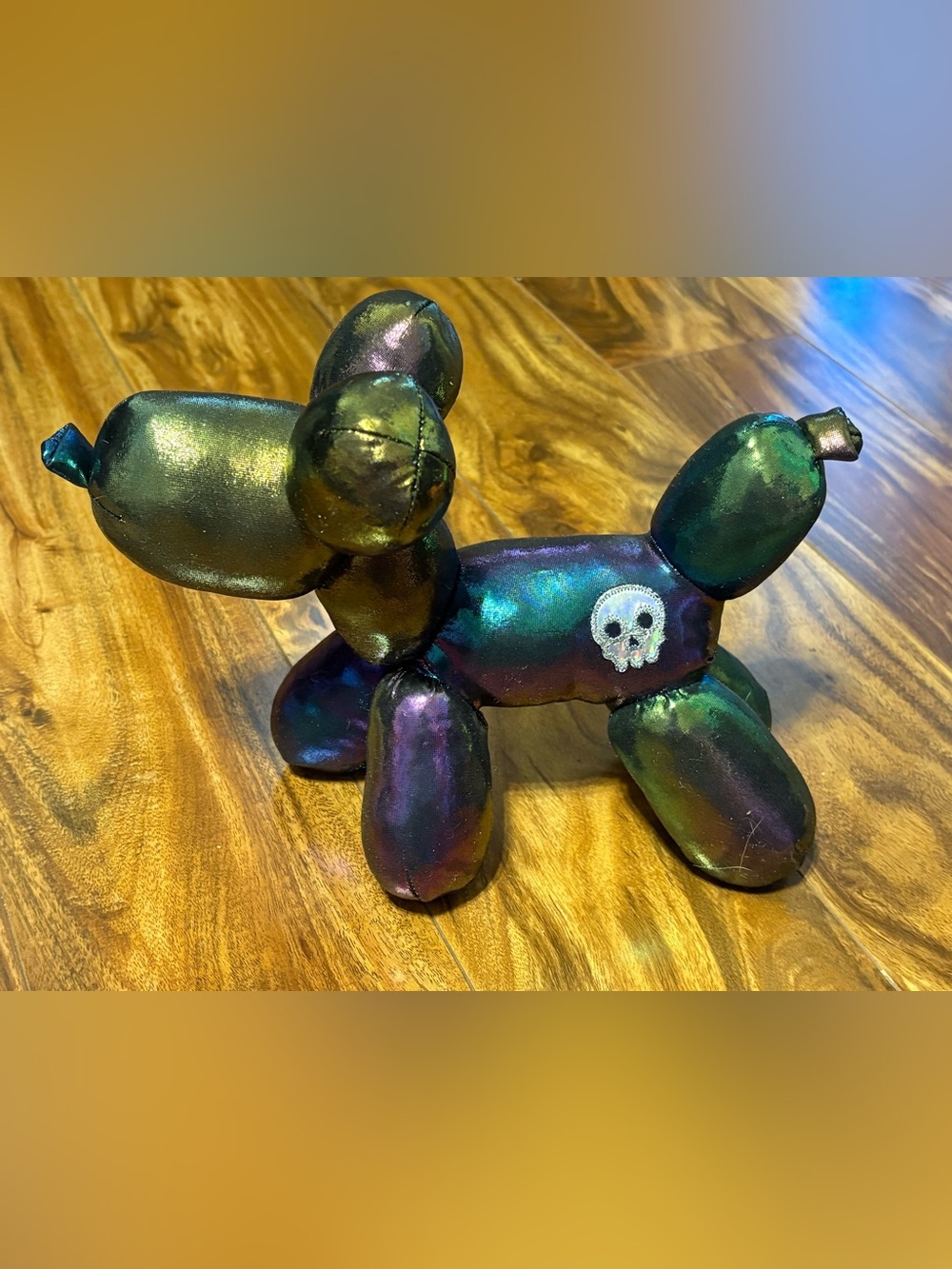 Iridescent Green Purple Balloon Dog Plush with Skull Accent